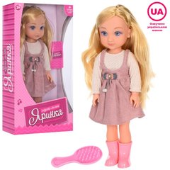 Лялька Яринка в рожевих чобітках у наборі з гребінцем, вміє співати пісеньку (українська мова),  M 4601
